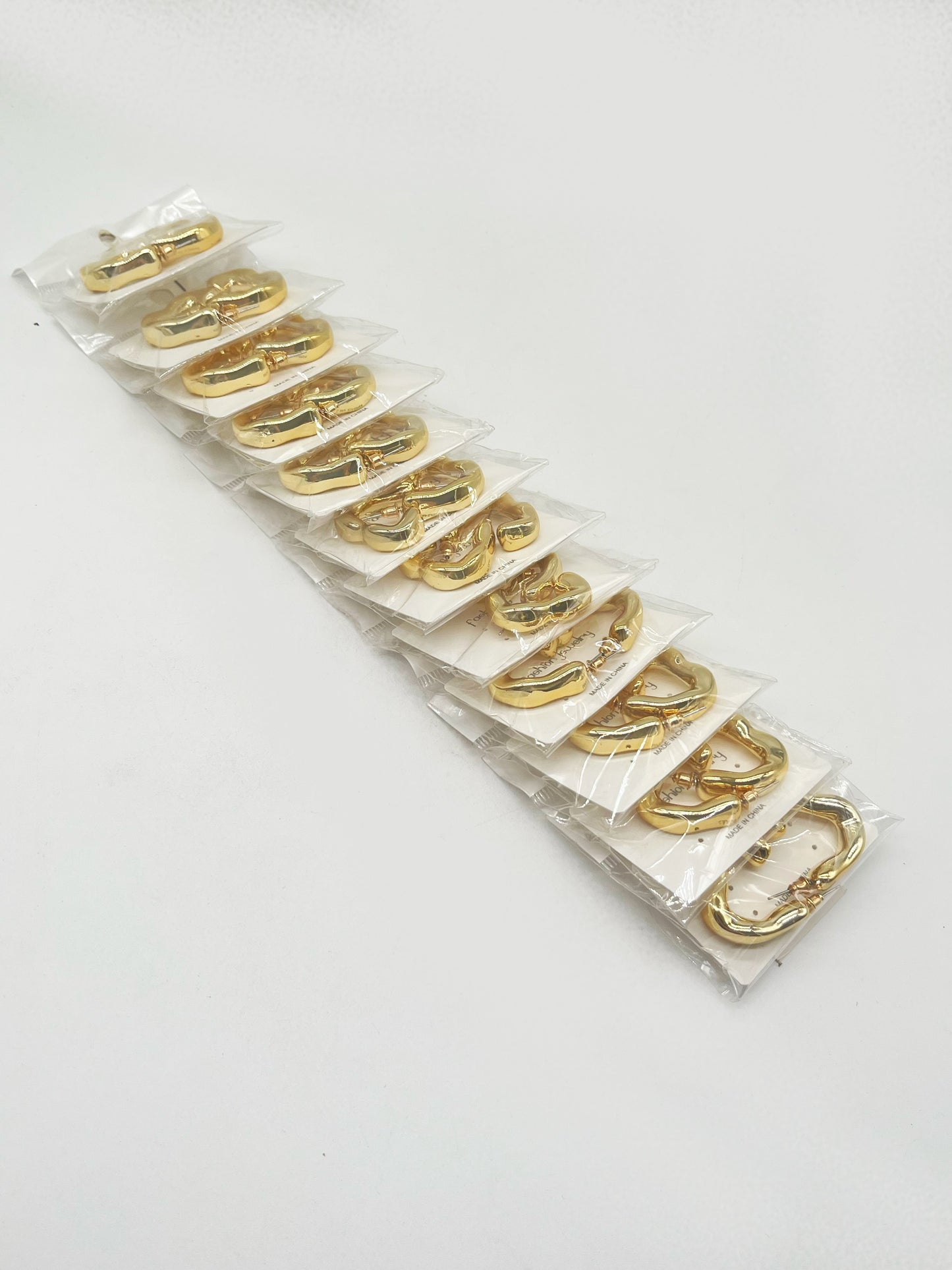 TIRA DE 12 ARITOS FASHION JEWELRY AF-12823 一包