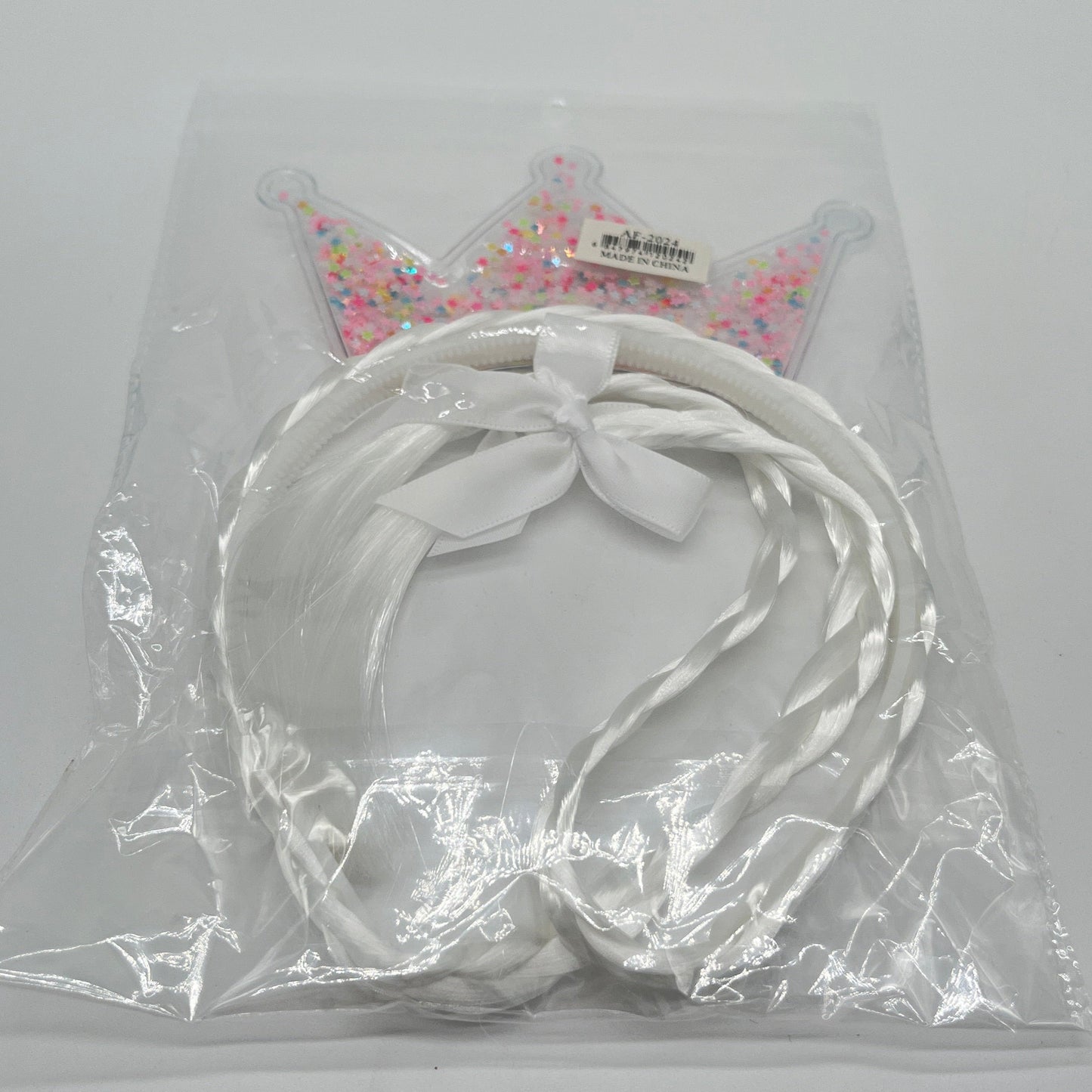 VINCHA CORONA CON TRENZAS AF-2024